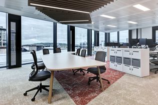 Collaborative work table with curved bespoke top