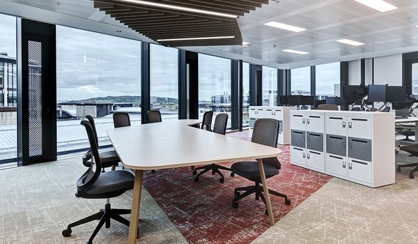 Collaborative work table with curved bespoke top